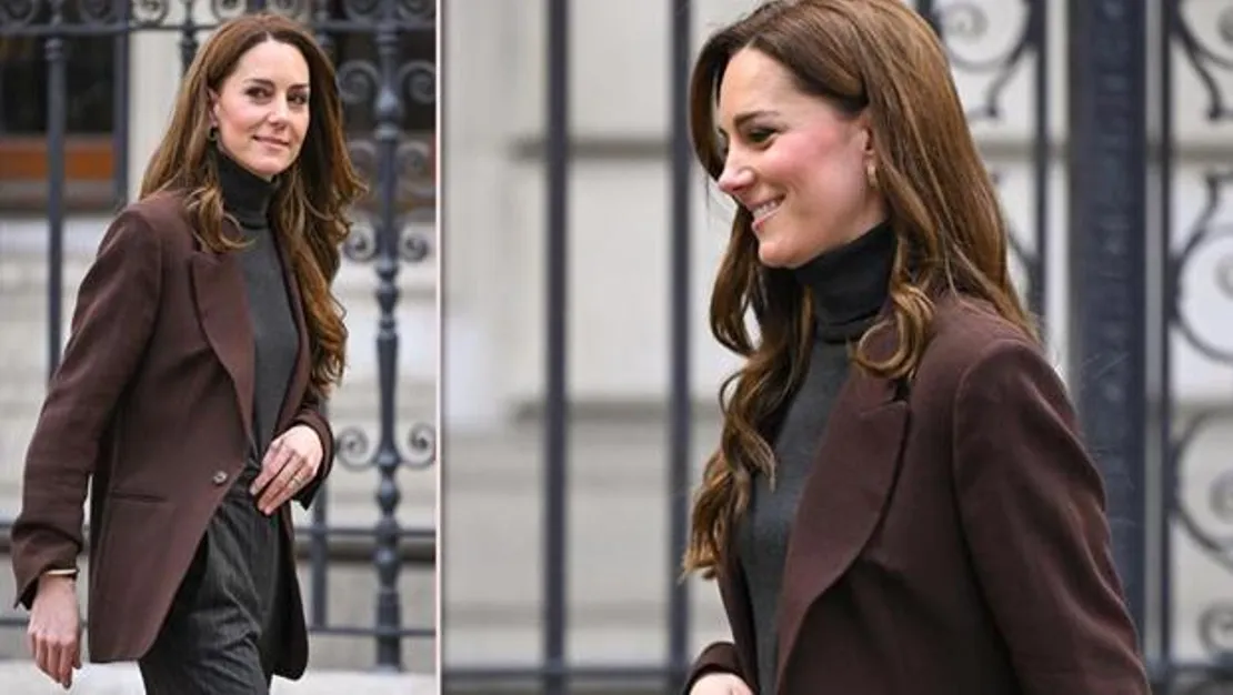 kate-in-ceketi-ruzgarda-uctu