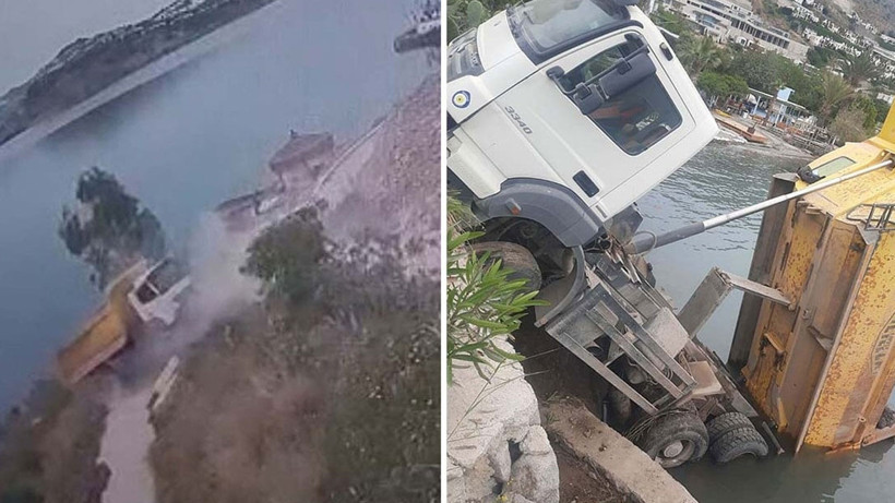 bodrum-da-hafriyat-kamyonu-deniz-kiyisinda-askida-kaldi