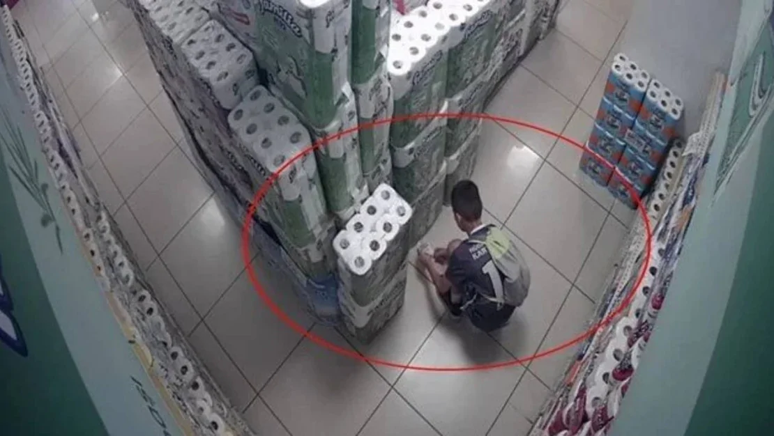 market-yangini-cocuk-yakip-kacti