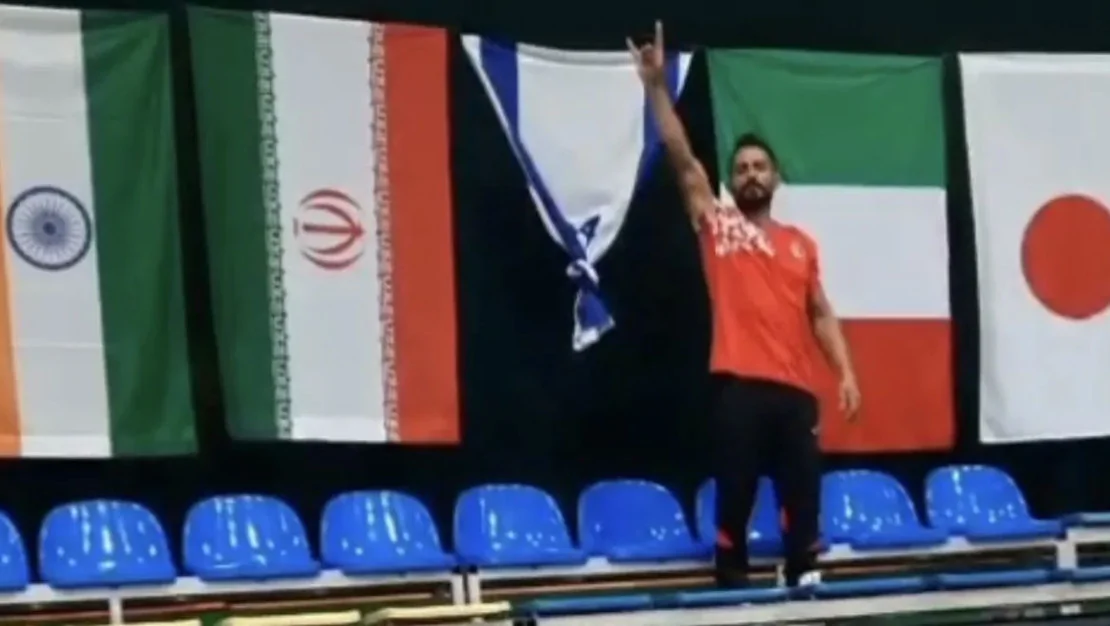 ceyhan-agbal-bronz-madalya-kazandi-bayragi-dugumledi